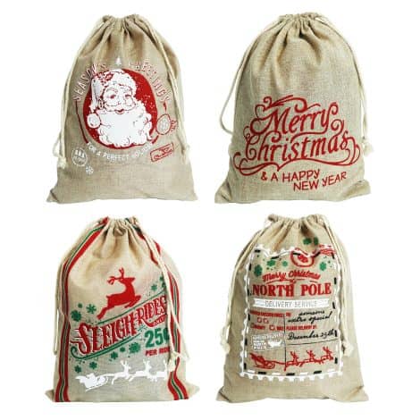 4 sacs cadeaux de Noël du Père Noël. Taille moyenne 30X40cm. Ensemble de 4 sacs.